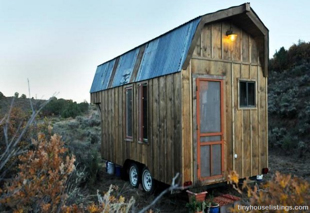 small rustic cabin on wheels